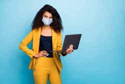 Photo of her she attractive chic classy lady using laptop wearing safety mask mers cov infection preventive measures working remotely from home wfh isolated blue color background