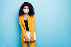 Photo of her she attractive chic classy lady agent broker real estate carrying laptop wearing safety gauze mask mers cov infection prevention stop pandemia isolated blue color background