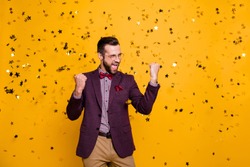 Photo of handsome wealthy clothes stylish guy business man well-dressed confetti falling successful best worker of year wear specs tie bow shirt blazer pants isolated yellow color background