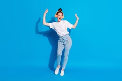 Full length body size view of her she nice attractive pretty dreamy cheerful cheery girl listening melody pop soul jazz bass having fun isolated on bright vivid sine vibrant blue color background