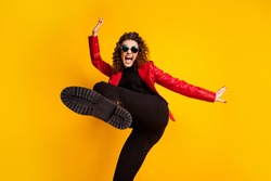 Photo of crazy girl raise leg wear trousers isolated over bright shine color background