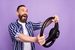 Profile side photo of impressed mature man drive fast car hold steering wheel isolated over purple color background