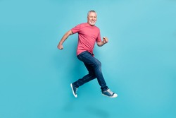 Full length body size photo smiling man jumping running fast on sale isolated pastel blue color background