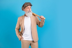 Portrait of attractive funky serious grey-haired man holding bat copy space isolated over bright blue color background