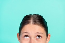 Cropped photo of curious lady look up empty space eye examination concept isolated teal color background