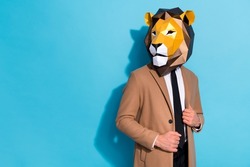 Photo of eccentric weird guy in lion mask look good virile empty space isolated over blue color background