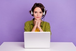 Photo of young woman confident consultant coworking agent headphone speaker isolated over violet color background