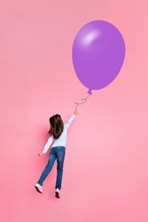 Full size back view collage photo of young lovely little girl follow her dream hold huge violet balloon isolated on pink color background