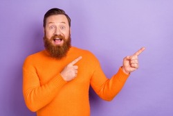 Photo of funky foxy young guy presenting black friday poster ad point fingers empty space isolated on violet color background