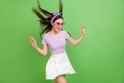 Photo of impressed millennial brunette lady wear band glasses t-shirt skirt isolated on green color background