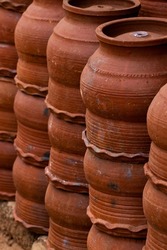 Collection of images with unglazed handmade  pottery pot made of red clay. Teracota vase. Pottery basics.
