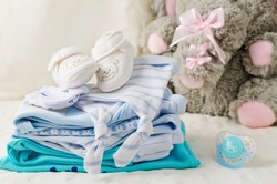 Baby clothes for newborn. In pastel colors