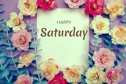 Happy Saturday typography text and flower decorate on purple background