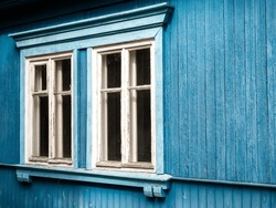 White wooden window on a blue wooden wall, Warsaw, Poland