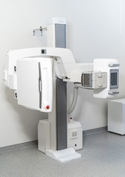 Equipment for roentgen in modern clinic. Remote controlled X-ray machine in modern clinic. Focus on part of roentgen apparatus
