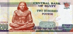 A fragment of reverse side of 200 Egyptian pounds banknote year 2020, observe side has an image of Mosque of Qani-Bay Cairo, Egypt. reverse side has an image of The Seated Scribe