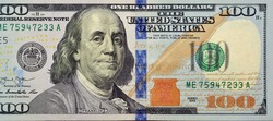 Large fragment of the Obverse side of 100 one hundred dollars bill banknote series 2013 with the portrait of president Benjamin Franklin, American money banknote, United States of America currency