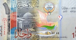 Large fragment of the obverse side of 1 KWD one Kuwaiti dinar bill banknote features the image of the grand mosque and a bateel dhow ship, Kuwaiti dinar is the currency of the State of Kuwait
