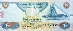 Large fragment of obverse side of 20 AED twenty Dirhams banknote of United Arab Emirates that features the image of Dubai creek golf and yacht club, selective focus of Emirates dirham money bill