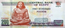 Large fragment of the reverse side of 200 LE two hundred Egyptian pounds banknote series 2021 features The Seated Scribe, selective focus of Egypt cash money bill by central bank of Egypt