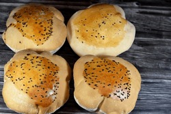 Egyptian Mahlab bread, puff thin, crispy and delicious with black seed baraka seeds on top, made of flour, dry yeast, milk, eggs, sugar, salt, black seeds, warm water, with anything or on its own