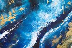 Acrylic blue and golden background. Abstract painting for banner, website, texture. Oil dark background with stars, ocean or sky. Paint splashes on canvas texture. Acrylic modern trendy painting. 