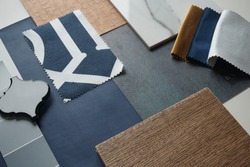 Moodboard. Material samples. Blue, gray, white, black, gold, warm wood.                      