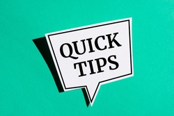 Quick Tips Concept speech bubble isolated on green background.