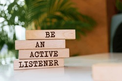 Wooden blocks with words 'Be An Active Listener'.