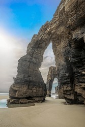 Famous eroded arches of Las Catedrales beach in Ribadeo, Lugo, Galicia, Spain
