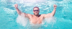 Summertime vacation. Summer man. Pool resort. Handsome man in swimmingpool. Guy in water. Spa resort. Banner for design header, copy space.