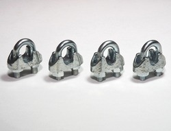 Wire rope clamps to secure wire ropes. Wire rope clips on white background. Tension cable assembly accessories