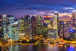 Singapore Skyline. Singapore`s business district, blue sky and night view for marina bay