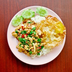 Stir fries Chicken breast with chili and Thai hot basil (Thai street food : Pad Kra Praow Kai)