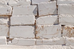 Big white blocks of raw marble in a quarry in Greece