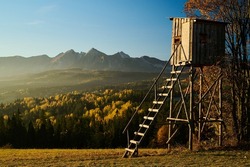 Tatras landscape in Poland. Hunting pulpit at the mountain. Sunrise. Passing summer and autumn in mountain.