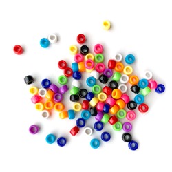 Colorful Rainbow Plastic Beads on White Background.  Kid's DIY Craft. Children's Necklace Beads