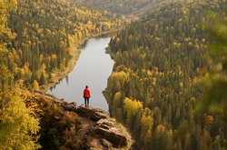 Beautiful Viewpoint on Usva River in Ural Mountains. Woman Standing on the Rock and Looking at the Usva River, Perm Region, Russia.