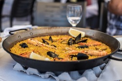 Paella recipe for two in traditional pan, recipe from Mediterranean
