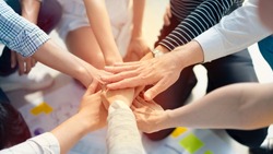 Hand join together for work togetherness, Hand stack for business and service, Team volunteering or teamwork. Concept connection of community and charity. Group of business workforce participation.