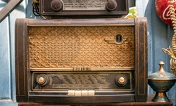 old ancient antique old history wooden radio ,old texture ,golden buttons 