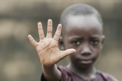 African Child Says STOP! To Racism and to War!
