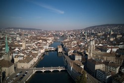Aerial view of City of Zürich with river Limmat, the medieval old town and lake Zürich on a sunny spring afternoon. Photo taken March 3rd, 2022, Zurich, Switzerland.