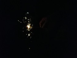 sparkling crackers in dark background