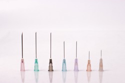 various size of syringe needles isolated on white