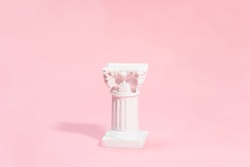 Product display with white roman column in minimalism style on a pink background. Perfect for beauty products or jewellery.