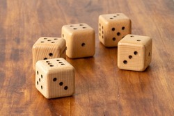 Playing dice handmade. A dice is a dice with six faces marked with numbers from 1 to 6. 