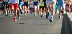 Running children, young athletes run in a kids run race