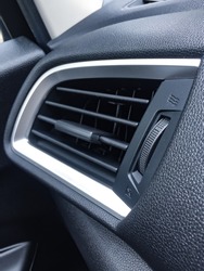 Air Conditioner in car and switch on/off compartment.