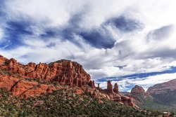 Amazing Red Rock Country near Sedona, Arizona. Displaying colorful sand & limestone rocks & cliffs, with blue sky & white clouds. Beautiful sunrises and sunsets. Unsurpassed Southwestern colors.